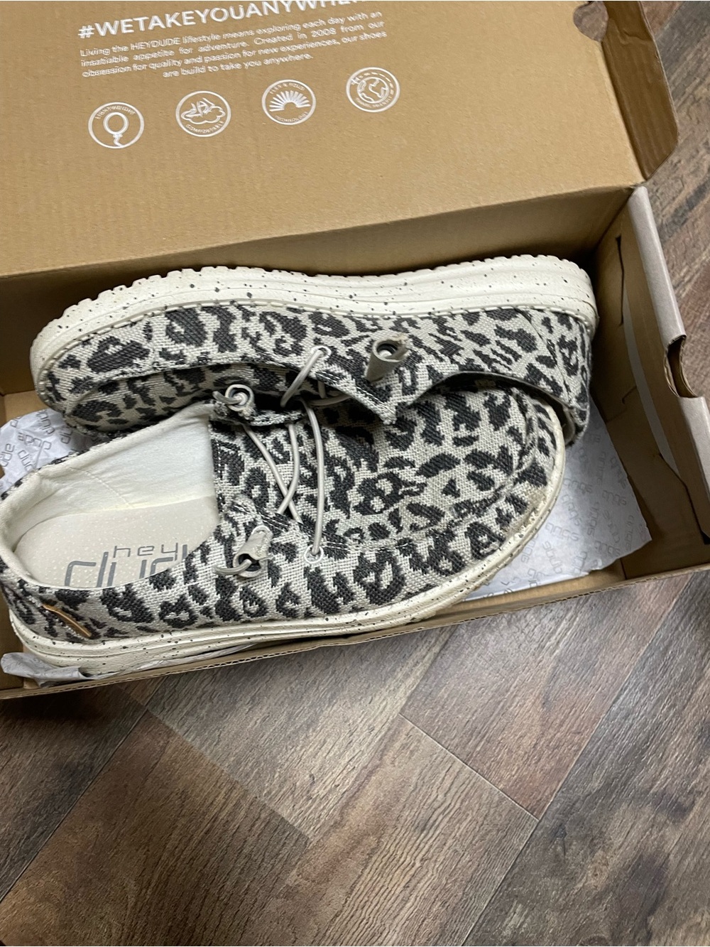 Hey Dude Women's Leopard Print Slip-On Sneakers in Black and White